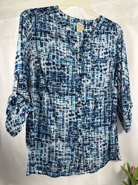 0163. NWOT. Multicolored blue blouse.